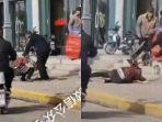 seorang-pria-menghajar-istrinya-sampai-tewas-di-depan-banyak-orang.jpg