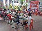 situasi-salah-satu-tempat-vaksinasi-covid-19-kota-manado.jpg
