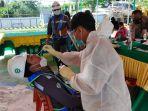 swab-antigen-yang-dilakukan-kepada-pekerja-dan-karyawan-di-pt-pp-bendungan-lolak.jpg