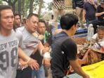tersangka-pembunuhan-saat-dibawa-ke-tpu-kandang-kawat.jpg