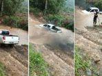 terseret-arus-sungai-ini-detik-detik-mobil-yang-dinaiki-anak-bupati-mamuju-tengah.jpg
