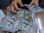 uang-dolar_20181010_004045.jpg