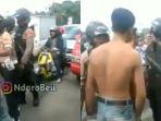 video-polisi-ditampar-oknum-mahasiswa.jpg