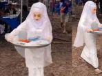 viral-video-pengantin-wanita-mengangkat-piring-kotor-tamuhingga-kaki-becek-saat-pernikahannya.jpg