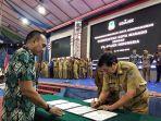 vp-regional-gojek-indonesia-timur-anandita-danaatmadja-kiri-dan-wali-kota-manado.jpg