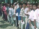 warga-kota-dili-dalam-pelaksanaan-penentuan-pendapat-di-timor-timur-30-agustus-1999.jpg