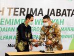 zulfan-adam-kanan-dan-edy-purwanto-menandatangani-berita-acara-serah-terima-jabatan.jpg