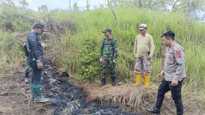Lokasi-semburan-diduga-minyak-di-wilayah-hutan-Dusun-Lengkong.jpg