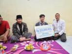 Bupati-IPIN-Serahkan-santunan.jpg
