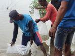 DKPP-Nganjuk-tabur-benih-ikan-tawes-ke-embung.jpg