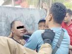 Kesal-tak-ada-tindakan-dari-polisi-seorang-warga-desa-di-Sukodono-Sidoarjo.jpg