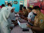 Perekaman-dan-pembuatan-KTP-untuk-para-siswa-SMASMK-oleh-Disdukcapil-Nganjuk.jpg