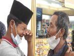 Pertemuan-Muhadi-dengan-anaknya-yang-terpisah-30-tahun.jpg
