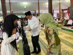 Pj-Gubernur-Jatim-Adhy-Karyono-didampingi-Bupati-Blitar-Rini-Syarifah-Rabu-2732024.jpg