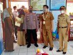 bhabinkamtibmas-trenggalek-diterjunkan-untuk-awasi-PTM-di-tingkat-SD.jpg