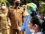 rapid-test-antigen-untuk-pelajar-SD-di-kota-Madiun-jelang-PTM.jpg
