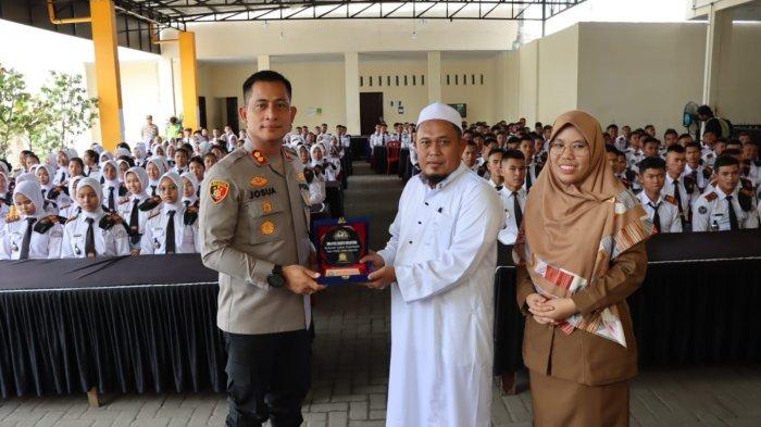 Kapolres Pelabuhan Belawan Pimpin Sosialisasi Penerimaan Polri Ke SMA Plus Sedayu Nusantara