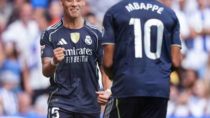 SELEBRASI - Dua penggawa Real Madrid, Arda Guler dan Kylian Mbappe selebrasi usai cetak gol ke gawang Real Sociedad di Liga Spanyol 2025-2026 pekan ke-4.