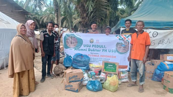 Yayasan Pusaka Indonesia (YPI) bekerja sama dengan Universitas Sumatera Utara (USU) menyerahkan bantuan paket sembako ke Desa Batang Ara, Kecamatan Bandar Pusaka, Aceh Tamiang,. Kamis (25/12/2025).