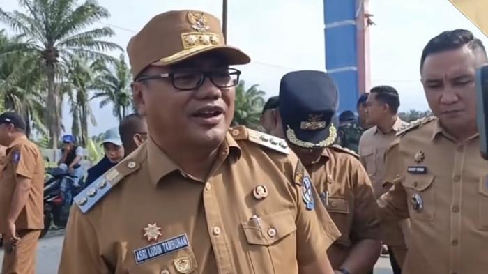 BUPATI DELI SERDANG VIRAL - Perkataan Bupati Deli Serdang, dr Asri Ludin Tambunan kembali viral di media sosial, bahkan jadi bahan hujatan warganet terkait jalan rusak diperbaiki tergantung warga yang bayar pajak.