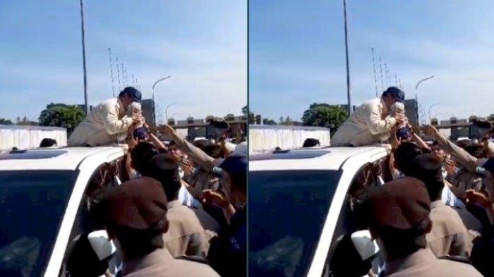 Momen Prabowo Cium Balita dari Atas Mobil Ketika Keluar Bandara Kualanamu