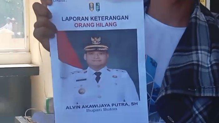 BUPATI BUTON HILANG - Puluhan warga bersama mahasiswa yang tergabung dalam organisasi kepemudaan melaporkan Bupati Buton, Alvin Akawijaya Putra, sebagai orang hilang ke Polres Buton, Kamis (18/9/2025). Ke mana Alvin Akawijaya? (Dok. video Warga via Kompas.com)