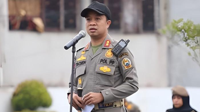 KASATPOL PP SUMUT- Moettaqien Hasrimi, Kasatpol PP Sumut saat memimpin apel anggotanya. Nama Moettaqien muncul dalam sidang korupsi pengadaan smartboard di Kota Tebing Tinggi.