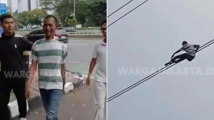 MOTIF Pria Bergelantungan Santai di Kabel Lalu Jatuhkan ke Pohon, Cari Perhatian Demi Pulang Kampung