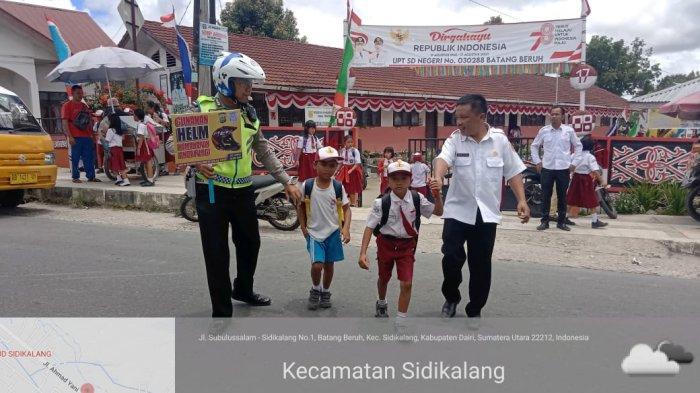 Polres Dairi Lakukan Strong Point Pengaturan Lalulintas