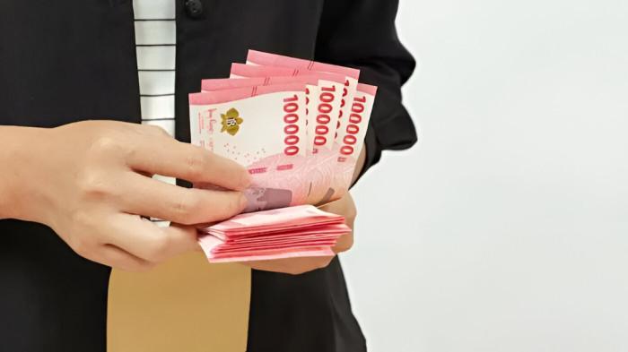 THR PNS- Ilustrasi pembayaran THR PNS sebelum perayaan Idul Fitri. Pada tahun 2026, diperkirakan THR PNS cair pada 13 Maret 2026.