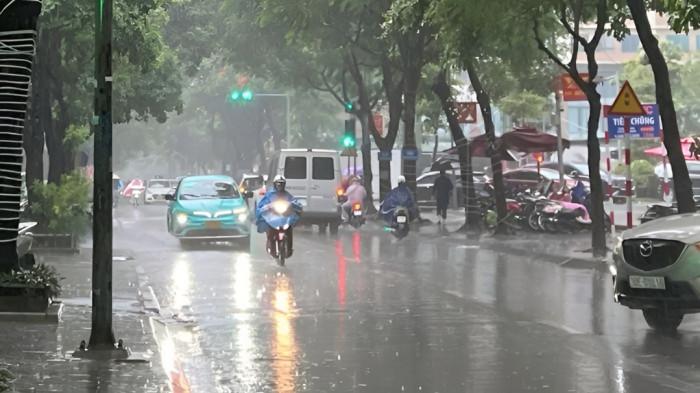 HUJAN LEBAT- Ilustrasi hujan lebat yang mengguyur sebuah kawasan perkotaan. Tampak jalanan basah diguyur hujan.