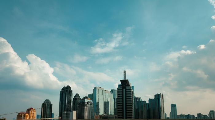 BERAWAN- Ilustrasi kondisi sebuat kota dengan cuaca berawan.