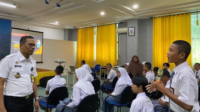 Kemenkumham Sumut Sosialisasikan Pencegahan Tindak Pidana Perdagangan Orang di SMAN 1 Plus Matauli