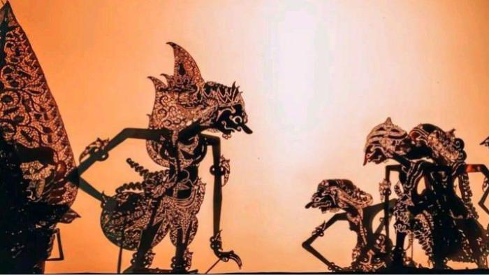 WAYANG KULIT- Ilustrasi pertunjukan wayang kulit yang merupakan peninggalan masyarakat Jawa.