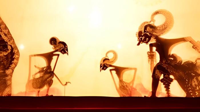 PEMENTASAN WAYANG- Ilustrasi pementasan wayang dalam kesenian masyarakat Jawa.