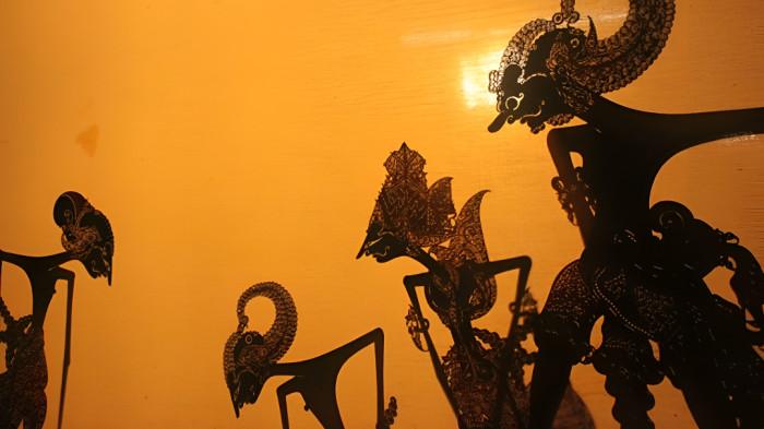 WAYANG KULIT- Ilustrasi kesenian wayang kulit yang merupakan bagian dari budaya masyarakat Jawa.
