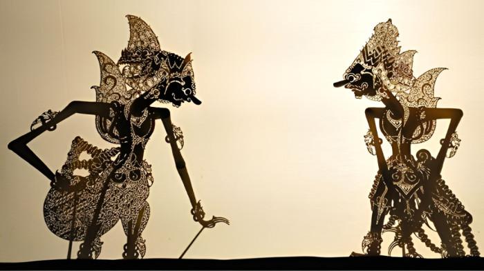 WAYANG KULIT- Ilustrasi pertunjukan kesenian wayang kulit yang merupakan bagian dari tradisi masyarakat Jawa.