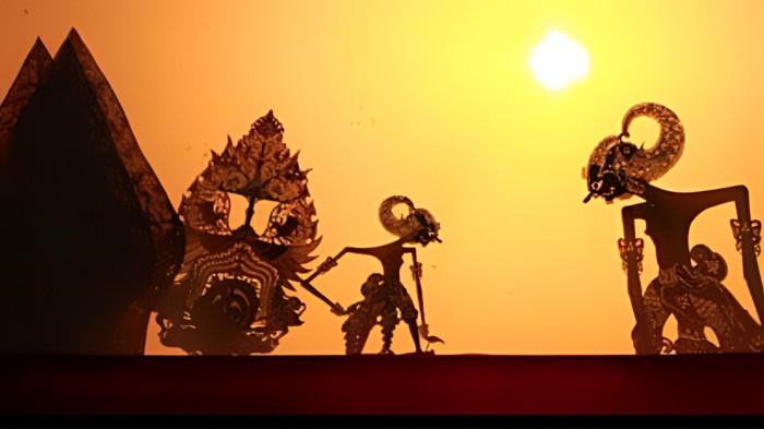 WAYANG KULIT- Ilustrasi pertunjukan wayang kulit yang merupakan warisan buda Jawa.