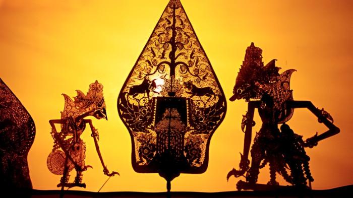 WAYANG KULIT- Ilustrasi kesenian wayang kulit yang merupakan bagian dari tradisi masyarakat Jawa.