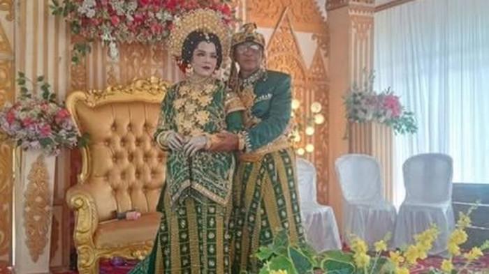 PERNIKAHAN DINI - Pernikahan H Buhari seorang pria berumur 71 tahun dengan gadis 18 tahun yang masih duduk di bangku SMA berinisial TA di Kabupaten Luwu, Sulawesi Selatan, viral di media sosial. (Tribun-timur.com/Ist)