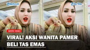 Aksi-Wanita-Pamer-Beli-Tas-Emas-Seharga.jpg
