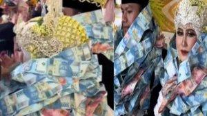HEBOH-Pengantin-Wanita-Dikalungi-Uang-Pecahan-Rp50-Ribu-Hingga-Rp100-Ribu-Terkuak-Artinya.jpg