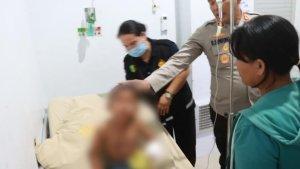Kapolres-Simalungun-membawa-bocah-5-tahun-yang-mendapat-luka-bakar-akibat-disetrika-tantenya-sendiri.jpg