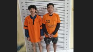 Kedua-tersangka-berinisial-RH-21-dan-MJ-23-saat-ini-ditahan-di-Polsek-Medan.jpg