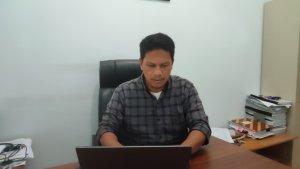 Komisioner-KPU-Sergai-Ardiansyah-Hasibuan-saat-diwawancarai-Tribun-Medan.jpg