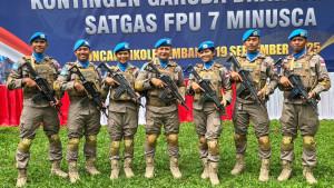 Momen-7-personel-Polda-Sumut-berfoto-bersama-sebelum-berangkat.jpg