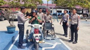 Penyandang-disabilitas-sekaligus-atlet-NPC-di-Kantor-Satlantas-Polres-Serdang.jpg