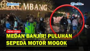Puluhan-Sepeda-Motor-Mogok-Akibat-Trobos-Genangan-Air-di-Jalan-SM-Raja-Menuju-Tanjung-Morawa.jpg