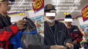 VIRAL-Aksi-Pria-Berseragam-Ormas-Beli-Rokok-Pakai-Koin-Ngakunya-Rp37-Juta-Larang-Kasir-Menghitung.jpg