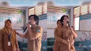 VIRAL-GURU-ASIK-KARAOKE-Viral-di-media-sosial-dua-orang-guru-di-SDN-Pandeglang-viral.jpg